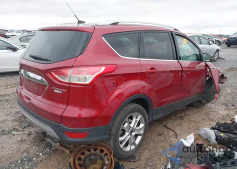 2016 Ford Escape Titanium z USA, uszkodzony, nr VIN 1FMCU9J91GUA90034
